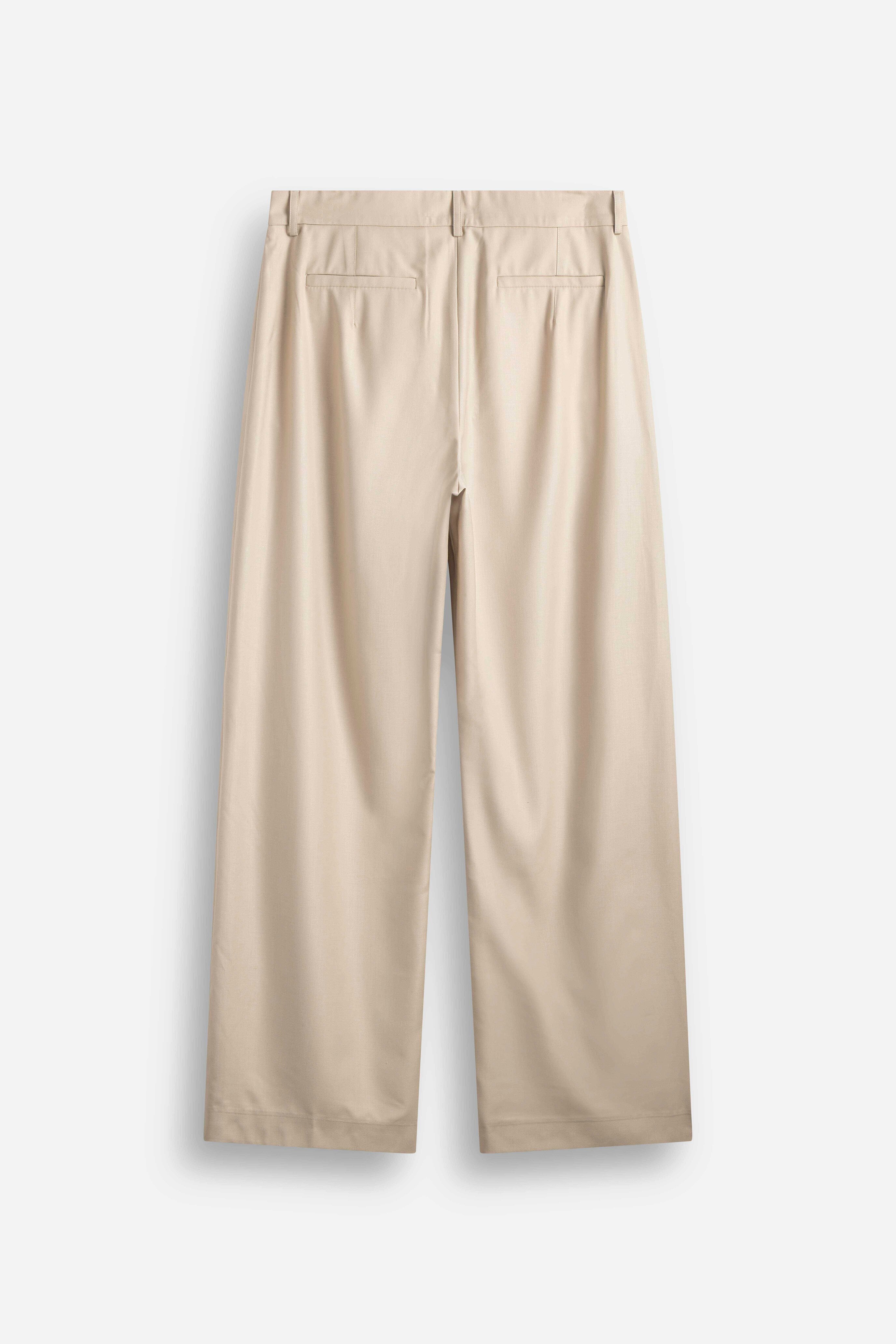 Pantalone con bustino Beige